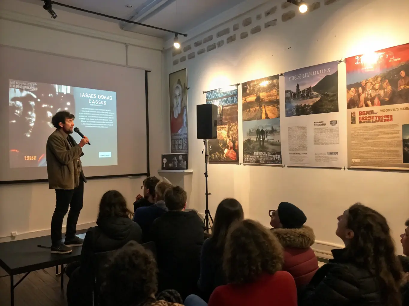 A vibrant scene from a CINEBASTIDE cultural film screening, showing a diverse audience engaged in a post-film discussion. The setting is a cozy, community-centered venue with film posters adorning the walls.